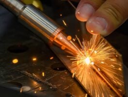 Close,Up,Scene,The,Laser,Welding,Process,With,The,Sparking